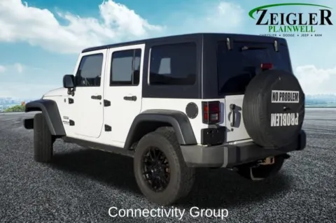 Photos of 2013 Jeep Wrangler Unlimited Sport for sale in Plainwell, MI at Zeigler Chrysler Dodge Jeep Ram of Plainwell