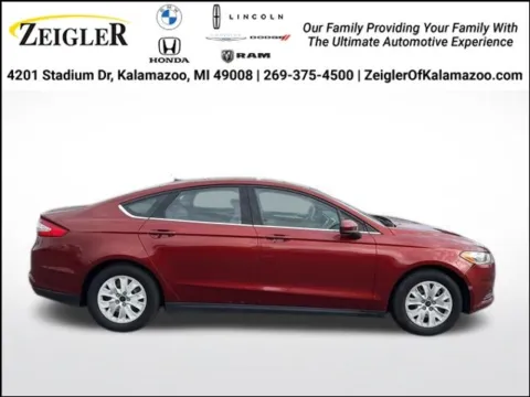 Orange 2014 Ford Fusion S for sale in Kalamazoo, MI