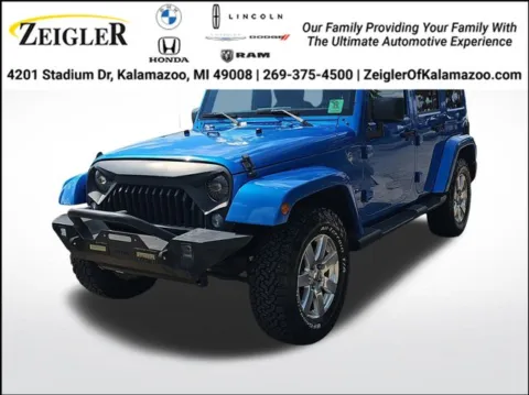 Blue 2016 Jeep Wrangler Unlimited Sahara for sale in Kalamazoo, MI
