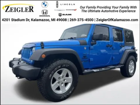 Blue 2015 Jeep Wrangler Unlimited Sport for sale in Kalamazoo, MI