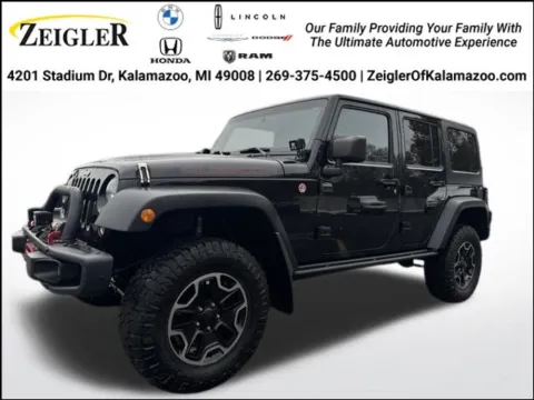 Black 2014 Jeep Wrangler Unlimited Rubicon for sale in Kalamazoo, MI