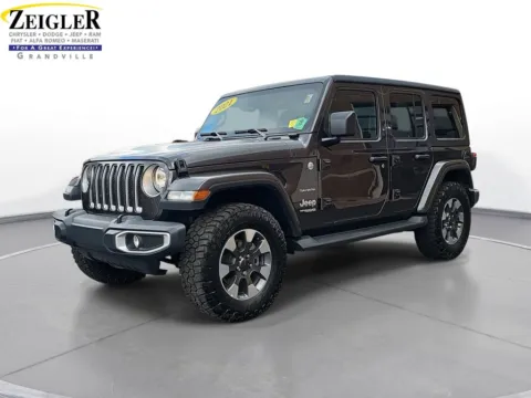 Gray 2021 Jeep Wrangler Unlimited Sahara for sale in Grandville, MI