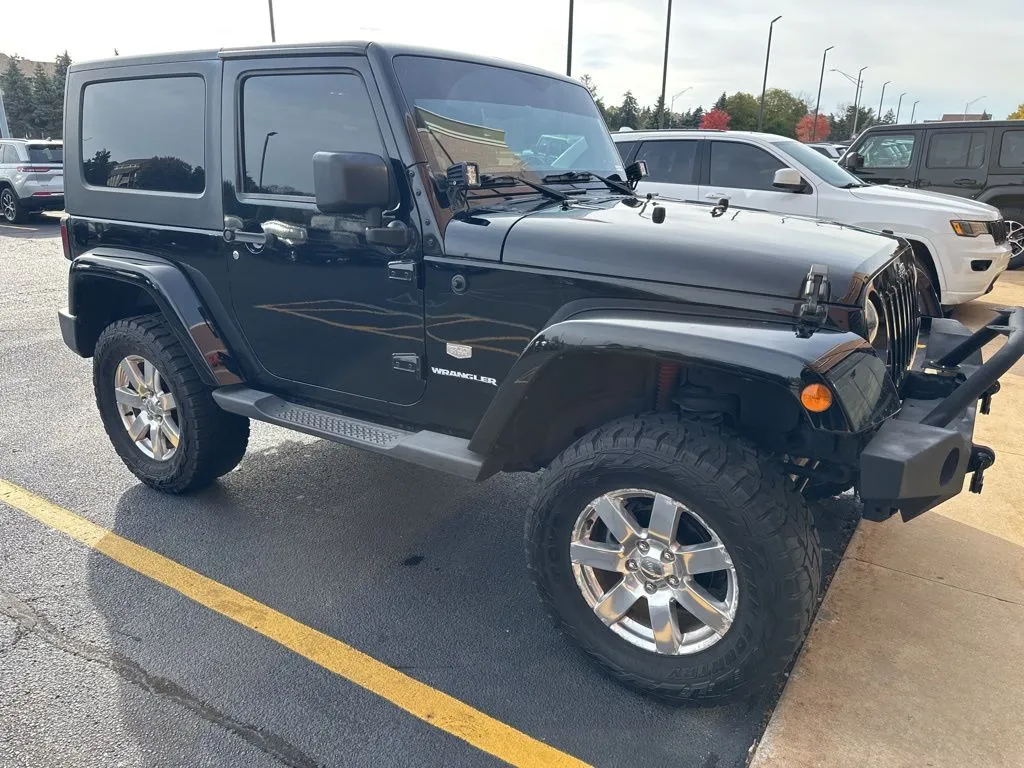 Black 2011 Jeep Wrangler 70th Anniversary Edition for sale in Grandville, MI