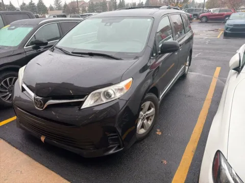 Black 2019 Toyota Sienna LE for sale in Grandville, MI