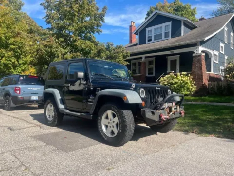Black 2011 Jeep Wrangler Sport for sale in Grandville, MI