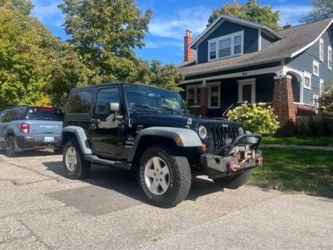 Black 2011 Jeep Wrangler Sport for sale in Grandville, MI
