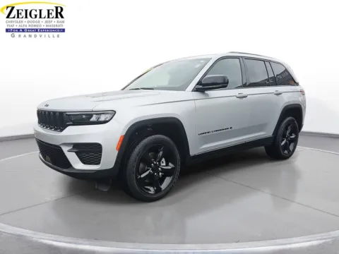 Silver 2023 Jeep Grand Cherokee Altitude for sale in Grandville, MI