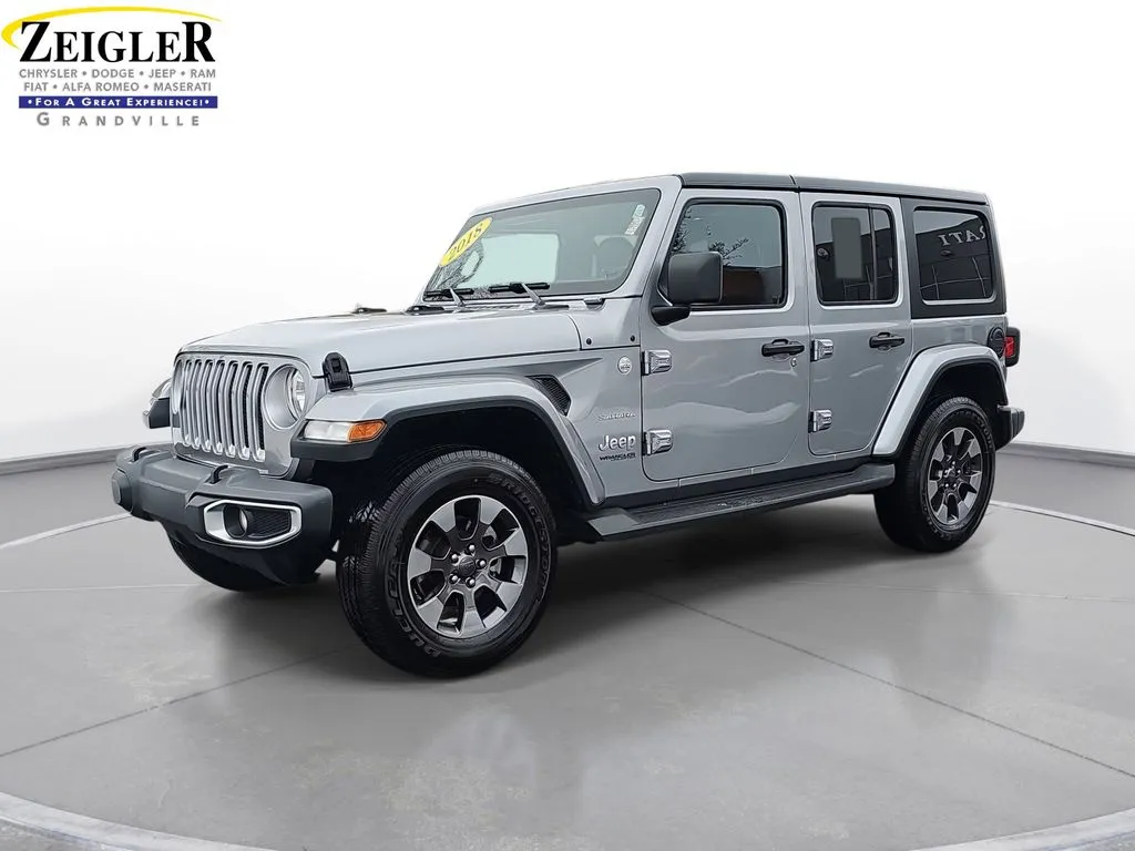Silver 2018 Jeep Wrangler Unlimited Sahara for sale in Grandville, MI