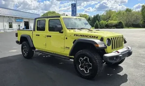 Yellow 2023 Jeep Gladiator Rubicon for sale in Grandville, MI