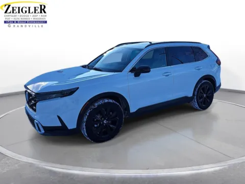 White 2023 Honda CR-V Hybrid Sport Touring for sale in Grandville, MI