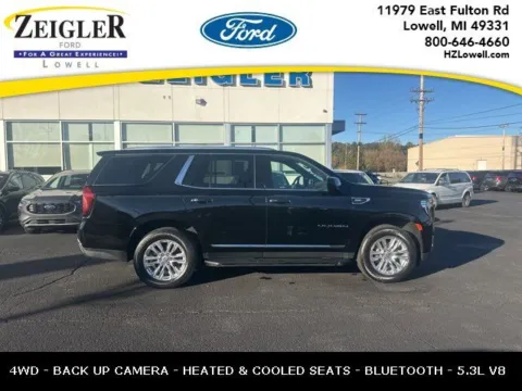 Black 2023 GMC Yukon SLT for sale in Grandville, MI