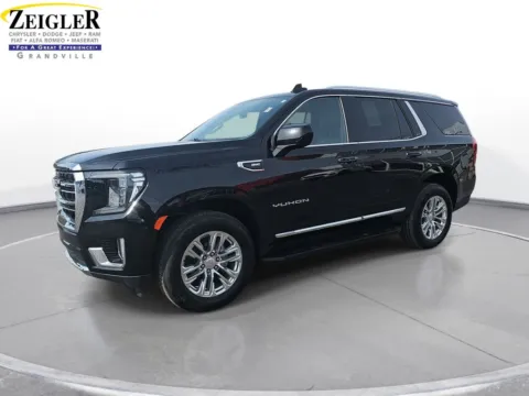 Black 2023 GMC Yukon SLT for sale in Grandville, MI