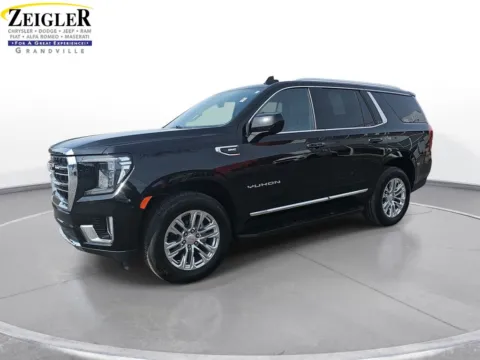 Black 2023 GMC Yukon SLT for sale in Grandville, MI