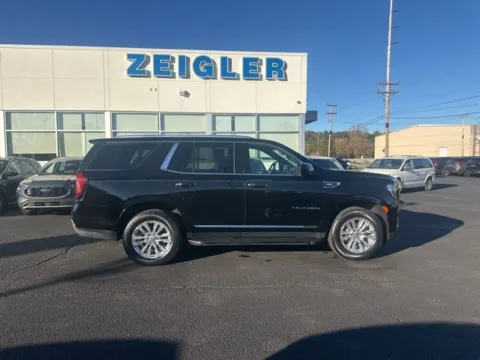 Black 2023 GMC Yukon SLT for sale in Grandville, MI