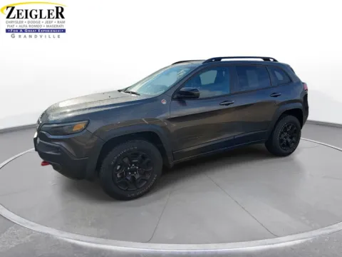 Gray 2022 Jeep Cherokee Trailhawk for sale in Grandville, MI