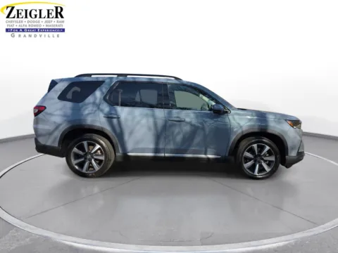 More photos of 2023 Honda Pilot Touring at Zeigler Chrysler Dodge Jeep Ram of Grandville, MI