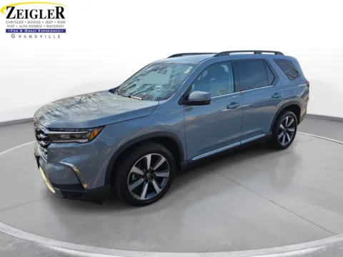 Black 2023 Honda Pilot Touring for sale in Grandville, MI