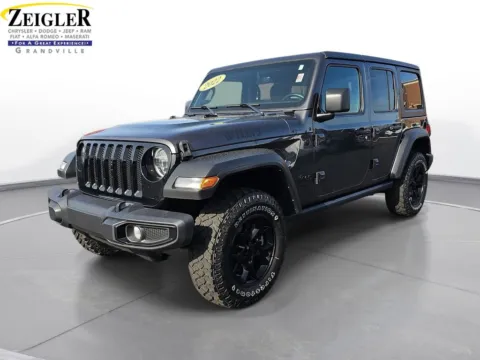 Gray 2022 Jeep Wrangler Unlimited Willys for sale in Grandville, MI
