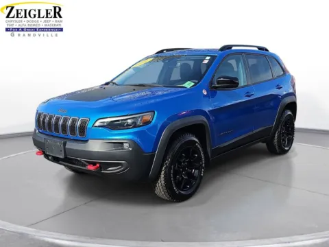 Blue 2022 Jeep Cherokee Trailhawk for sale in Grandville, MI
