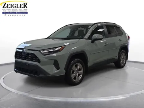 Gray 2023 Toyota RAV4 Hybrid XLE for sale in Grandville, MI