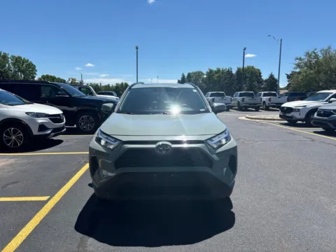 Gray 2023 Toyota RAV4 Hybrid XLE for sale in Grandville, MI