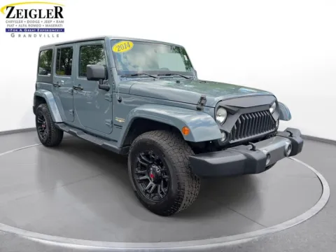 Another view of 2014 Jeep Wrangler Unlimited Sahara for sale in Grandville, MI at Zeigler Chrysler Dodge Jeep Ram of Grandville