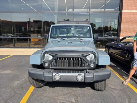 Photos of 2014 Jeep Wrangler Unlimited Sahara for sale in Grandville, MI at Zeigler Chrysler Dodge Jeep Ram of Grandville