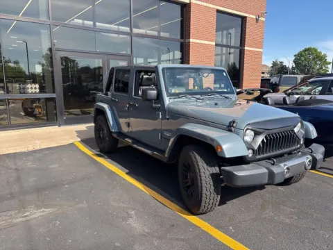 Another view of 2014 Jeep Wrangler Unlimited Sahara for sale in Grandville, MI at Zeigler Chrysler Dodge Jeep Ram of Grandville