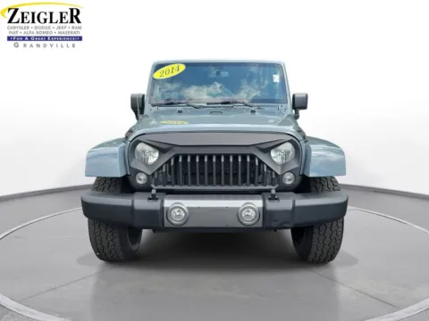 Photos of 2014 Jeep Wrangler Unlimited Sahara for sale in Grandville, MI at Zeigler Chrysler Dodge Jeep Ram of Grandville