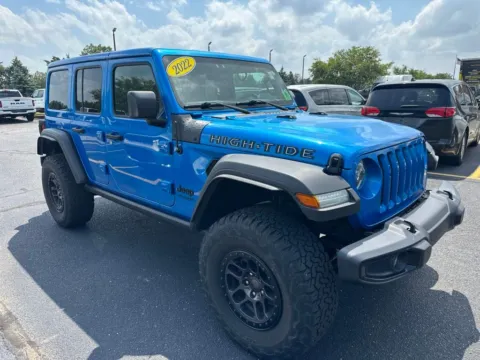 Blue 2022 Jeep Wrangler Unlimited High Tide for sale in Grandville, MI