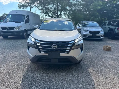 Silver 2024 Nissan Rogue SV for sale in Grandville, MI