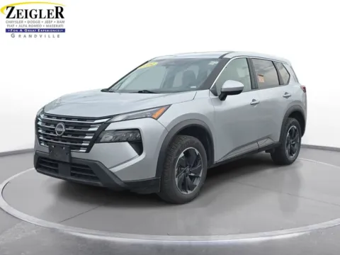 Silver 2024 Nissan Rogue SV for sale in Grandville, MI