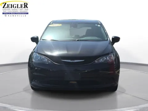 Photos of 2023 Chrysler Voyager LX for sale in Grandville, MI at Zeigler Chrysler Dodge Jeep Ram of Grandville