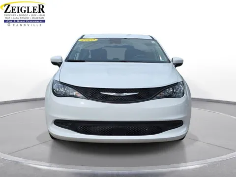 Photos of 2023 Chrysler Voyager LX for sale in Grandville, MI at Zeigler Chrysler Dodge Jeep Ram of Grandville
