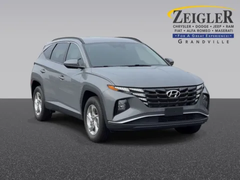 Gray 2025 Nissan Rogue SV for sale in Grandville, MI