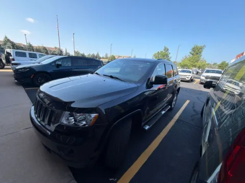 Black 2013 Jeep Grand Cherokee Laredo for sale in Grandville, MI