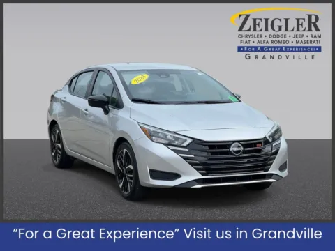 Silver 2024 Nissan Versa 1.6 SR for sale in Grandville, MI