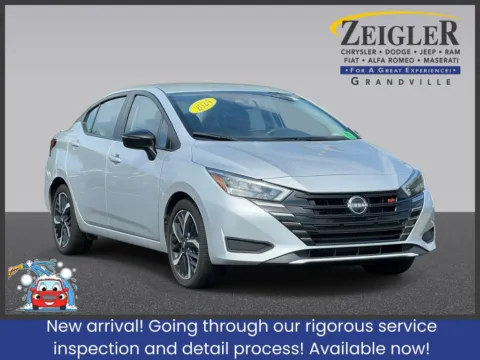 Silver 2024 Nissan Versa 1.6 SR for sale in Grandville, MI
