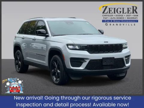 Silver 2023 Jeep Grand Cherokee Altitude X for sale in Grandville, MI