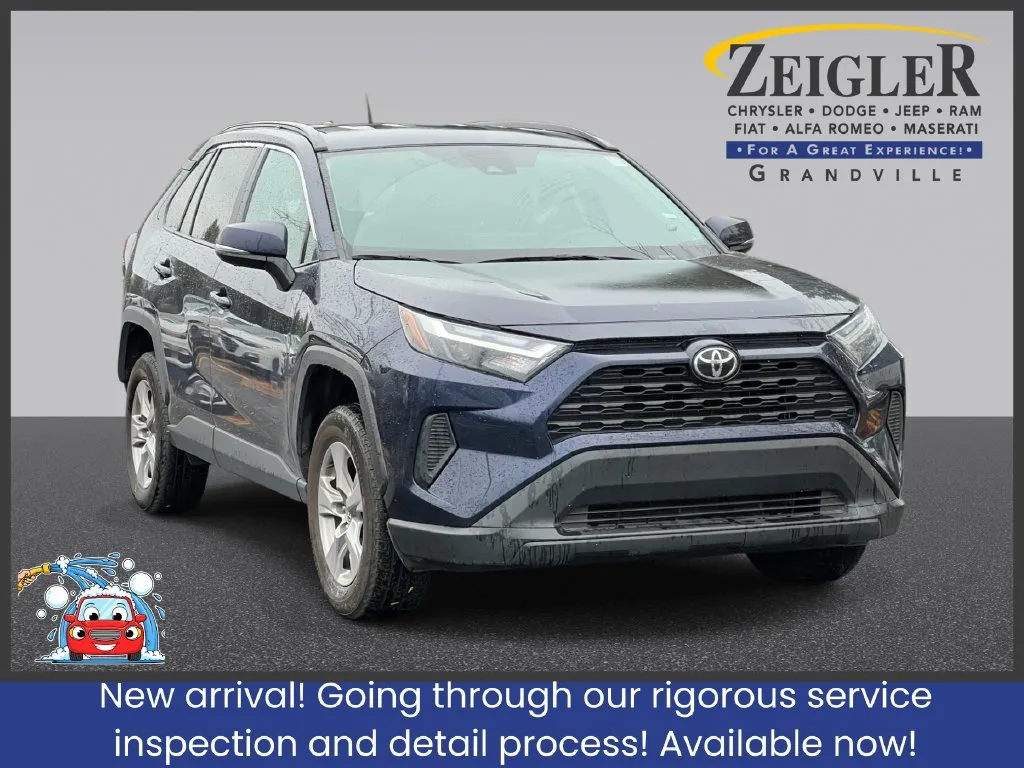 Blue 2025 Toyota RAV4 XLE for sale in Grandville, MI