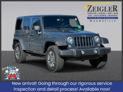 Gray 2016 Jeep Wrangler Unlimited Rubicon for sale in Grandville, MI