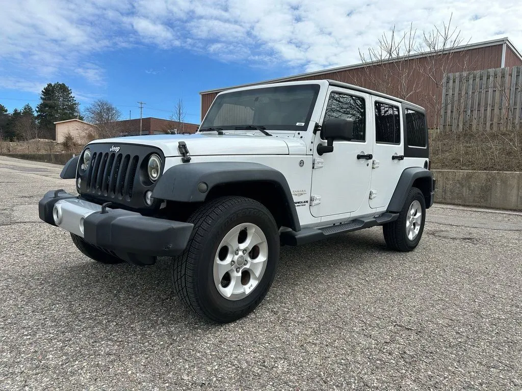 White 2014 Jeep Wrangler Unlimited Sahara for sale in Grandville, MI