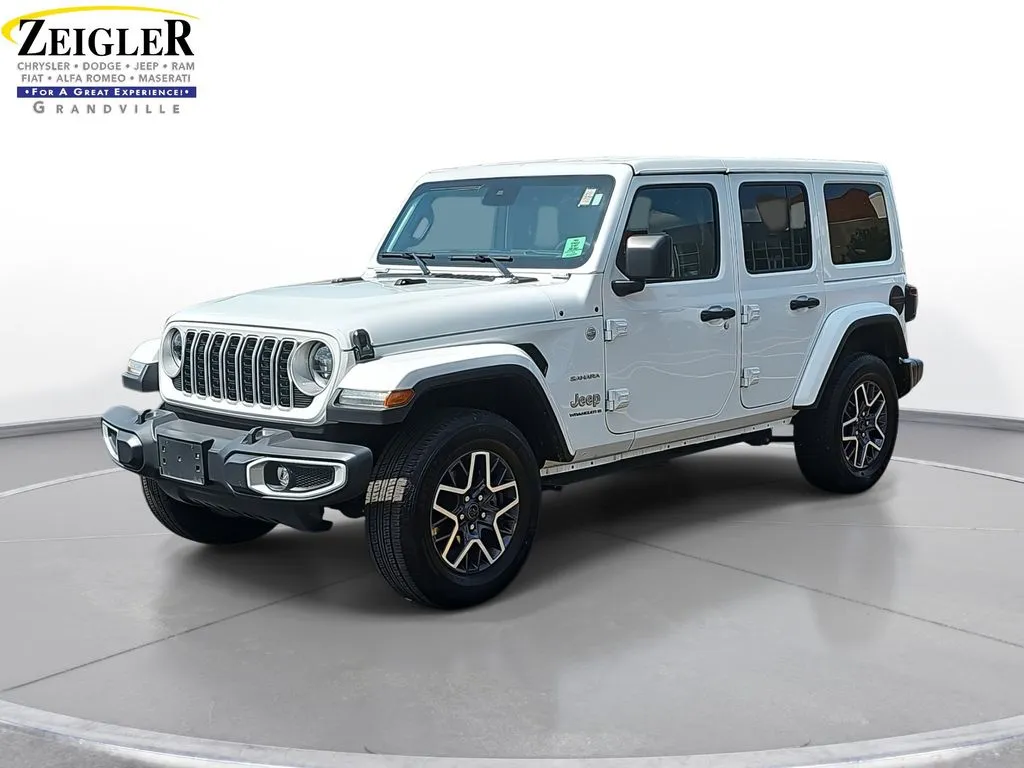 White 2024 Jeep Wrangler Sahara for sale in Grandville, MI