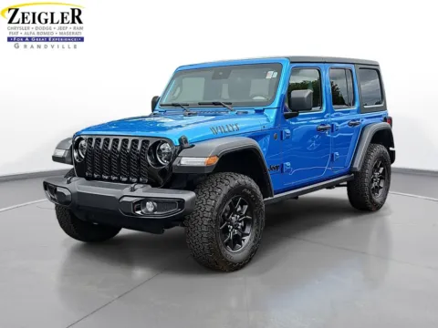 Blue 2024 Jeep Wrangler Willys for sale in Grandville, MI