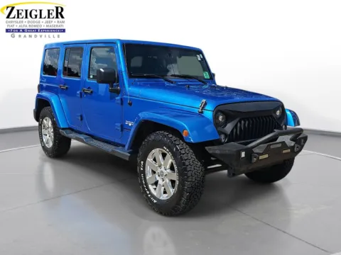 Another view of 2016 Jeep Wrangler Unlimited Sahara for sale in Grandville, MI at Zeigler Chrysler Dodge Jeep Ram of Grandville
