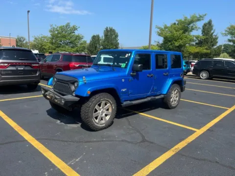 Photos of 2016 Jeep Wrangler Unlimited Sahara for sale in Grandville, MI at Zeigler Chrysler Dodge Jeep Ram of Grandville