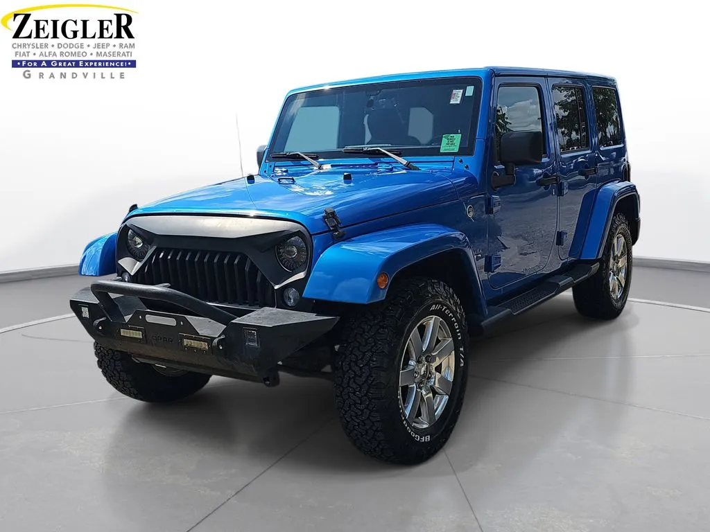 Blue 2016 Jeep Wrangler Unlimited Sahara for sale in Grandville, MI