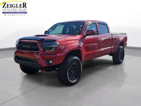 Red 2015 Toyota Tacoma for sale in Grandville, MI