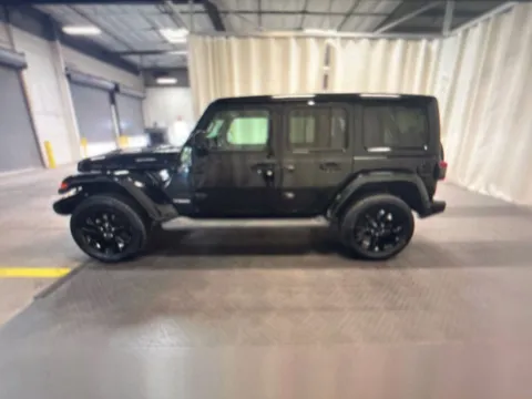 Black 2021 Jeep Wrangler Unlimited Sahara Altitude for sale in Grandville, MI