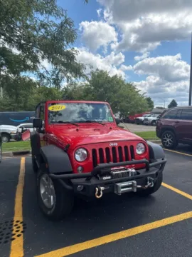 Red 2017 Jeep Wrangler Sport for sale in Grandville, MI